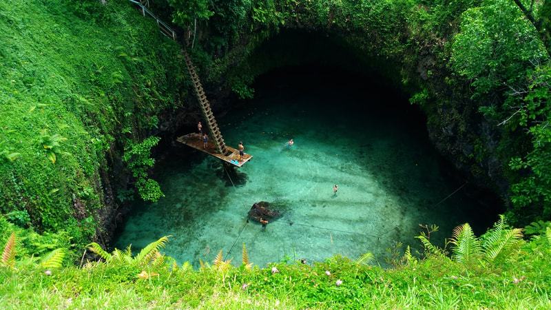The complete civle of To Sua Ocean Trench from above.